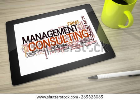 An image of a tablet pc with tag cloud management consulting
