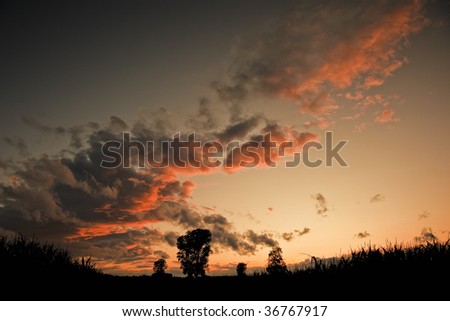 A photography of a dramatic sky sunset