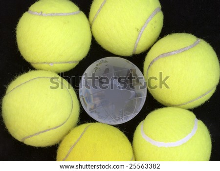 Six tennis ball and one globe