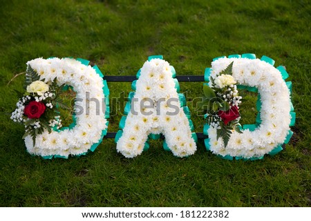 funeral flowers in the name of dad