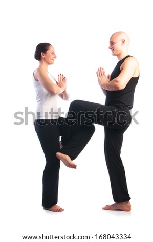 Yoga seria: Couple in Shiva Nataraja Pose,The Lord (or King) of Dance Pose isolated on white background
