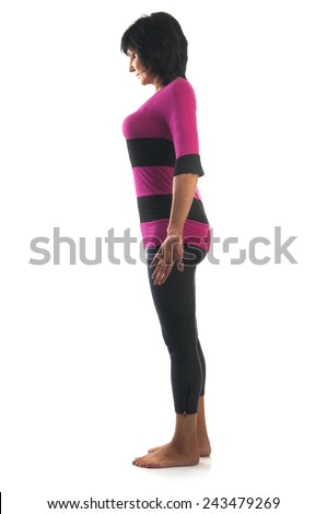 Yoga seria: Mature woman in Tadasana Pose (Samasthiti or Mountain Pose) yoga pose isolated on white background.