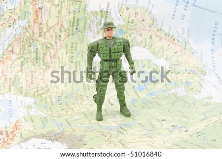 toy soldier on world map