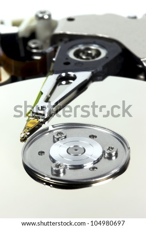 Macro of opened computer hard drive.