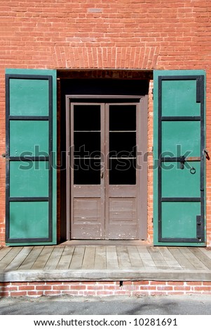 Vintage Steel Fire Doors On Old Brick Building in an American Gold Mining Town