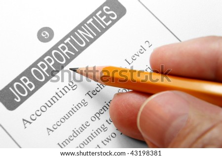 Job Opportunity Classified Advertising with Human Hand Holding Yellow Pencil