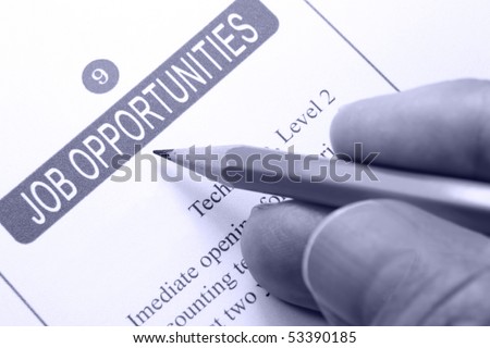 Job Opportunity Classified Advertising with Human Hand Holding Yellow Pencil