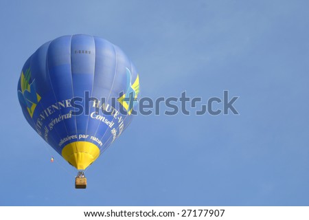 PUTRAJAYA, MALAYSIA - MARCH 22 : A hot air balloon from France in flight at the first Putrajaya International Hot Air Balloon Fiesta in Putrajaya, Malaysia on March 22, 2009.