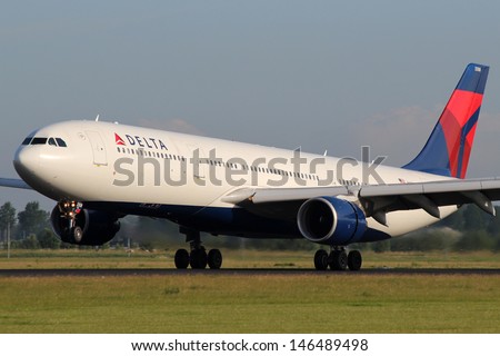 AMSTERDAM - JULY 02: Delta Air Lines Airbus A330 lands at AMS Airport in Netherlands on July 02, 2012.  Delta is one of the biggest airlines in the world serve over 300 destinations around the world