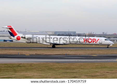 PRAGUE, CZECH REPUBLIC - DECEMBER 15: Regional Jet CRJ-1000  Hop (Air France) taxis to take off from PRG Airport on January 03, 2014. Hop is a regional subsidiary of Air France.