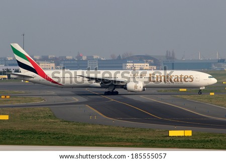 PRAGUE, CZECH REPUBLIC - MARCH 29: Emirates Airlines Boeing 777-31H taxis to take off at PRG Airport on March 29, 2014. Emirates Airlines is an airline based in Dubai.