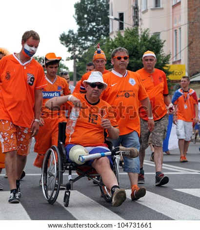 KHARKIV, UKRAINE - JUNE 9: Netherlands fans at Kharkov streets before UEFA EURO 2012 football match vs. Denmark national team, June 9, 2012 in Kharkiv, Ukraine