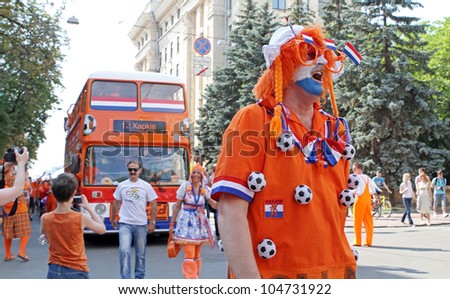 KHARKIV, UKRAINE - JUNE 9: Netherlands fans at Kharkov streets before UEFA EURO 2012 football match vs. Denmark national team, June 9, 2012 in Kharkiv, Ukraine