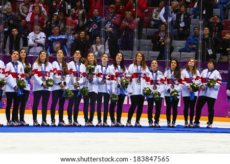 Sochi, RUSSIA - February 20, 2014: Suisse Women\'s Ice hockey team bronze medalists, at medal ceremony after Gold Medal Game at the Sochi 2014 Olympic Games