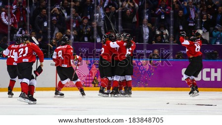 Sochi, RUSSIA - February 20, 2014: Canadian Women\'s Ice hockey team celebrating gold medals, after Gold Medal Game vs. USA team at the Sochi 2014 Olympic Games