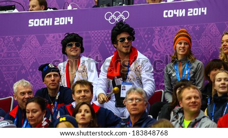 Sochi, RUSSIA - February 20, 2014: Matchgoers at Ice hockey Women\'s Gold Medal Game Canada vs. USA at the Sochi 2014 Olympic Games