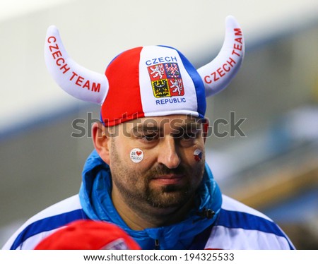 Sochi, RUSSIA - February 18, 2014: Czech team fans on tribunes during Ice hockey Men\'s Play-offs Qualifications Game vs. Slovakia team at the Sochi 2014 Olympic Games