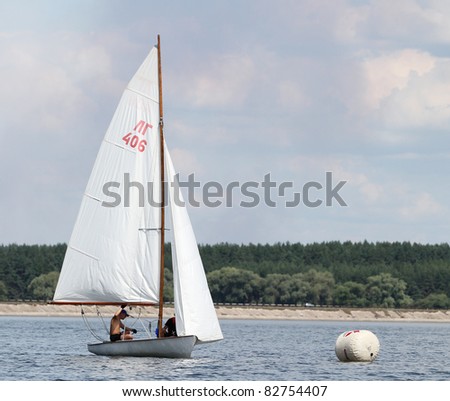 STARY SALTOV,UA - AUGUST 6: Class Flying Dutchman sailing boats unidentified participants compete during Slobozhanshina Sailing Cup. August 6, 2011 in Stary Saltov, Ukraine