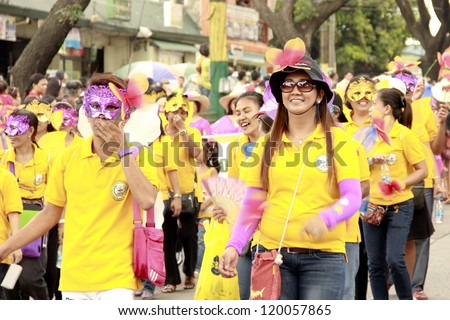 CAVITE, PHILIPPINES - NOV. 26: Government employees participate in the 2nd Paru-paro Festival on November 26, 2012 in Dasmarinas, Cavite. Celebrating a street party and dance competition.
