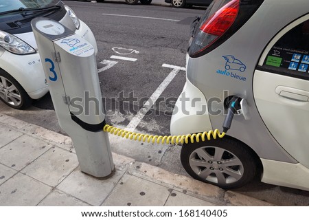 NICE, FRANCE - MAY 1: Electric cars at a charging station on May 1, 2013 in Nice, France.