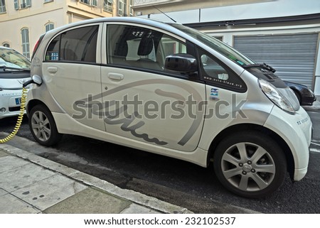 NICE, FRANCE - JUNE 2, 2014: Electric cars charging on a street in the city of Nice.