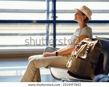Similar – Image, Stock Photo Calm Asian female traveler standing on suspension bridge over river