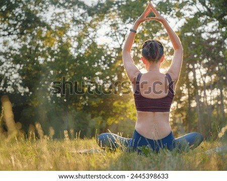 Image, Stock Photo Slim woman doing meditation on beach