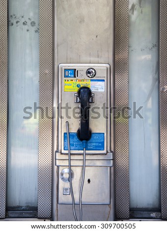 NEW YORK CITY, USA - SEPTEMBER, 2014: Old fashioned pay phone in Manhattan New York
