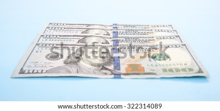 Four hundred dollar notes. All on blue background