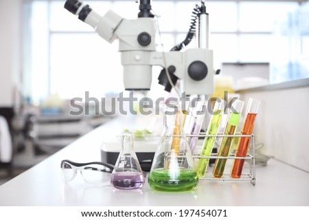 the laboratory test tubes with colorful liquid with  Microscopes In Laboratory/lab