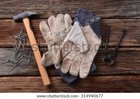 hammer, work gloves, pliers and nails - tools carpenter