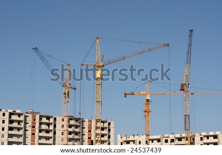 Construction of new apartment houses with application of tower cranes
