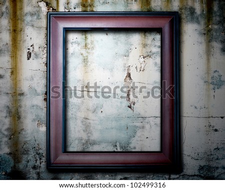 Old picture frame on wall to put your own pictures in.
