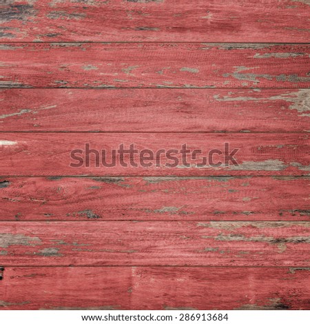Vintage wood background with peeling paint., Red color.