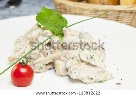 mushrooms with meat cooked in cream sauce