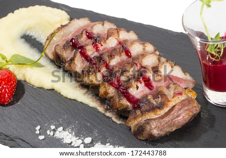 baked goose breast with mashed potatoes and apple sauce