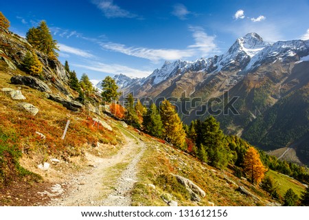 Bietschorn mountain peak in autumn with hiking trail. View from Laucheralp, Loetschental, Wallis, Switzerland