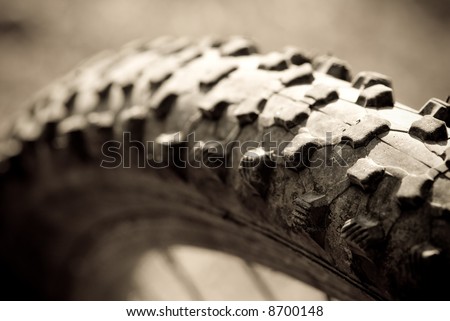 Bike tire pattern in black and white. Low depth of field.