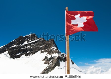 National Flag of Switzerland with the Jungfrau mountain peak