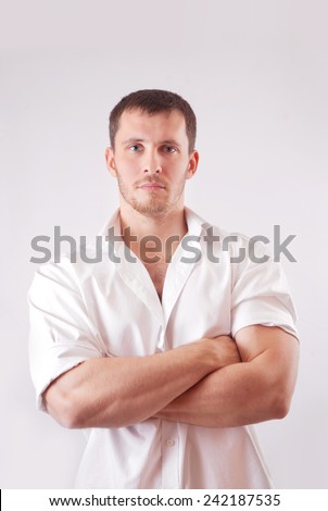 Man with white shirt over white background