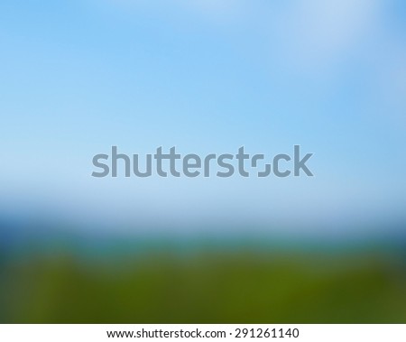 Blurred abstract background, mountains with blue sky