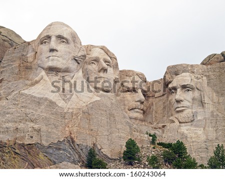 Sculpted images of Presidents George Washington, Thomas Jefferson. Theodore Roosevelt, and Abraham Lincoln at the Mt. Rushmore National Memorial, Keystone, South Dakota