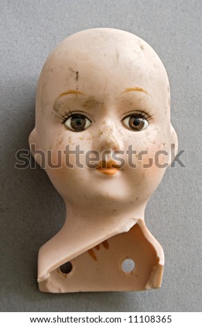 head of an old doll