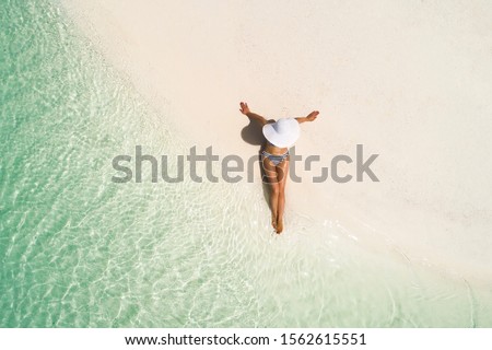 Similar – Image, Stock Photo Slim woman wearing swimming cap in pool