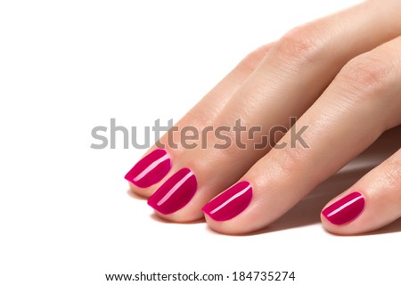 Woman hands with manicured pink  nails closeup. Skin and nail care.
