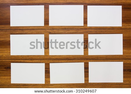 Business cards on a wooden background.