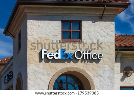 MORGAN HILL, CA/USA - FEBRUARY 22, 2014:  FedEx Office Building. FedEx Office is a chain of stores  providing a retail outlet for FedEx Express and FedEx Ground shipping, .