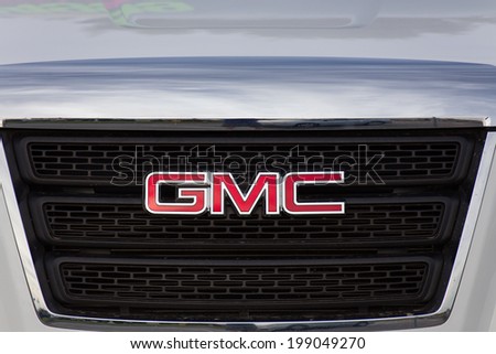 SALINAS, CA/USA - JUNE 14, 2014: GMC logo and grille. General Motors Corporation is an American automobile division of the American manufacturer General Motors.