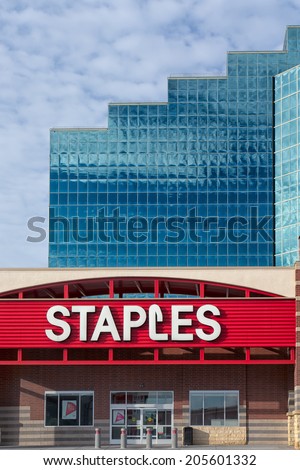 BLOOMINGTON, MN/USA - JUNE 22, 2014: Staples office supply store. Staples sells supplies, office machines, promotional products, furniture, technology, and business services  in stores and online.