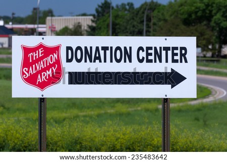 BLOOMINGTON, MN/USA - JUNE 21, 2014: Salvation Army donation center sign. The Salvation Army is a nonprofit organization that provides job training programs for people with disabilities.
